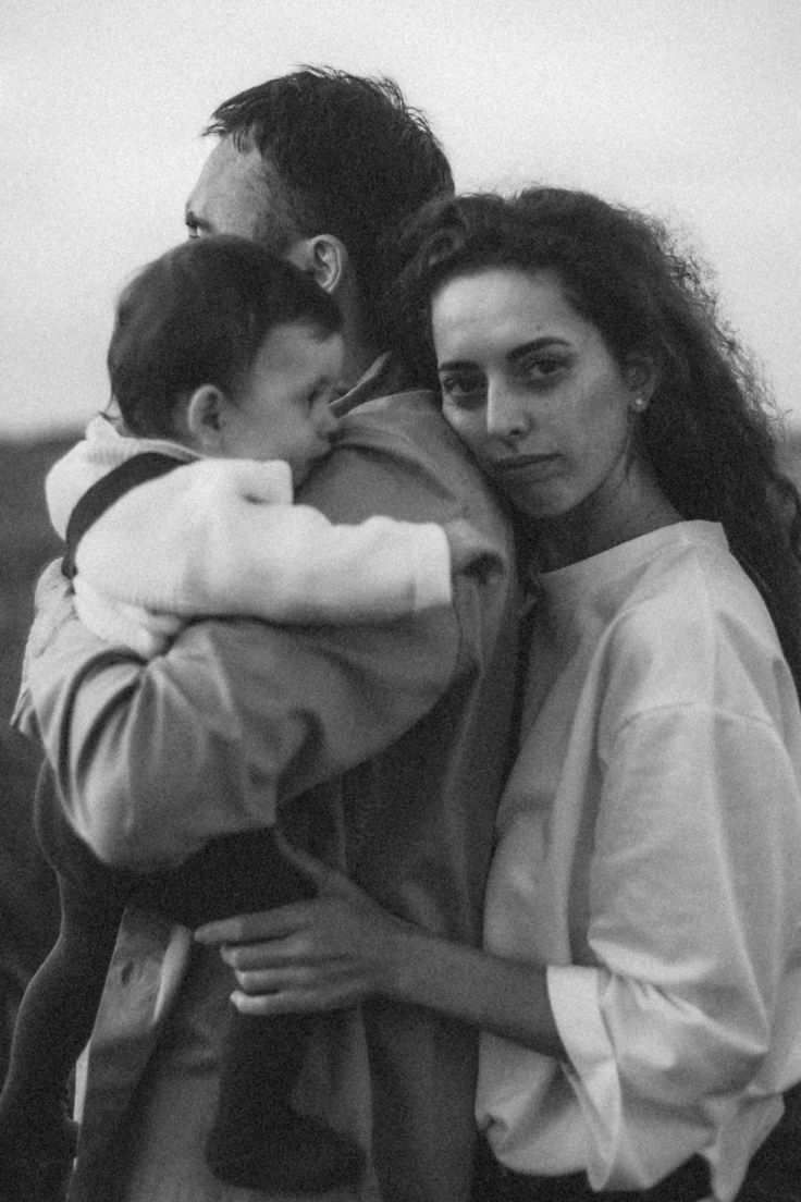 A parent holding a child